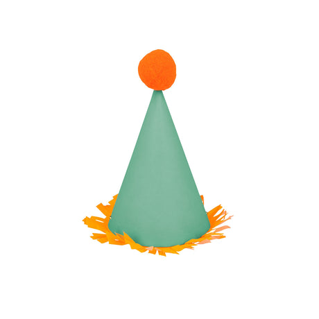 Green mini party hat with orange pom-pom and fringe trim on white background. Useful for festive party decor.