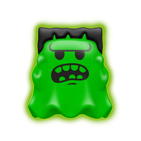 Green Frankenstein-style Glowy Ghost NeeDoh squishy fidget toy with black hair and a grumpy face on a white background.