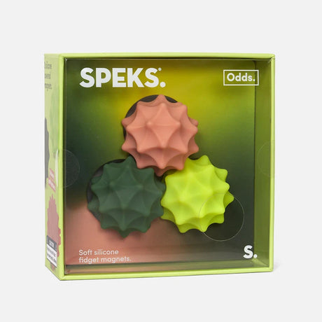 Boxed Speks Odds fidget magnets with three spiky silicone spheres in pink, dark green, and yellow.