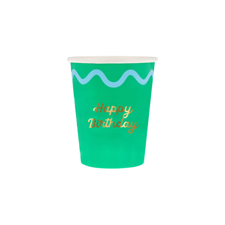 Green paper cup with a light blue wavy line and "Happy Birthday" written in gold script font.