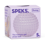 Purple packaging of a Speks stress ball, featuring a textured, dimpled design. Text reads "The memory gel stress ball." Tone is calming and playful.