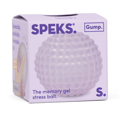 Purple packaging of a Speks stress ball, featuring a textured, dimpled design. Text reads "The memory gel stress ball." Tone is calming and playful.