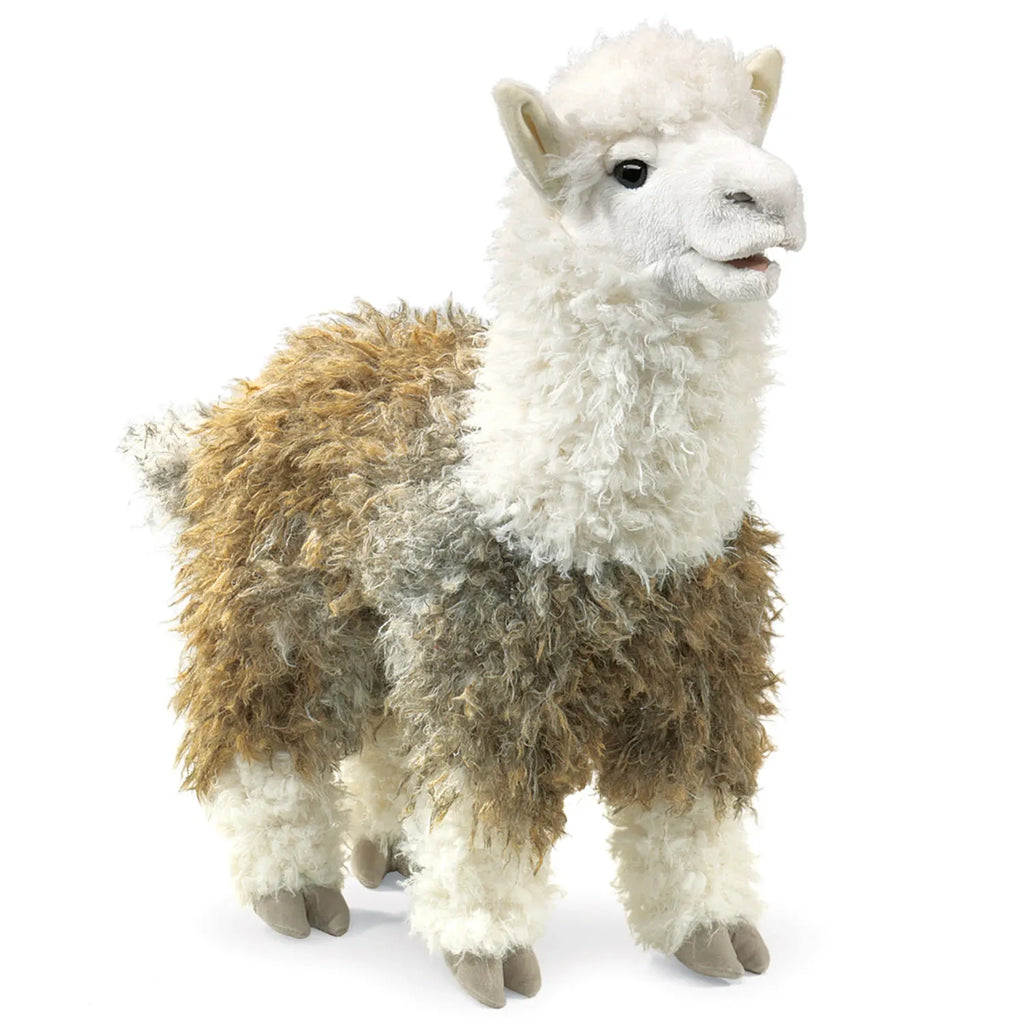 A plush toy llama with soft, fluffy fur stands against a white background. Its coat is a mix of brown and white, with a friendly expression.