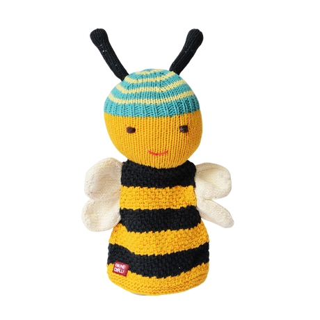Smiling knitted bee toy with a striped yellow and black body, blue and yellow head with antennae, and white wings, on a white background. Cheerful tone.