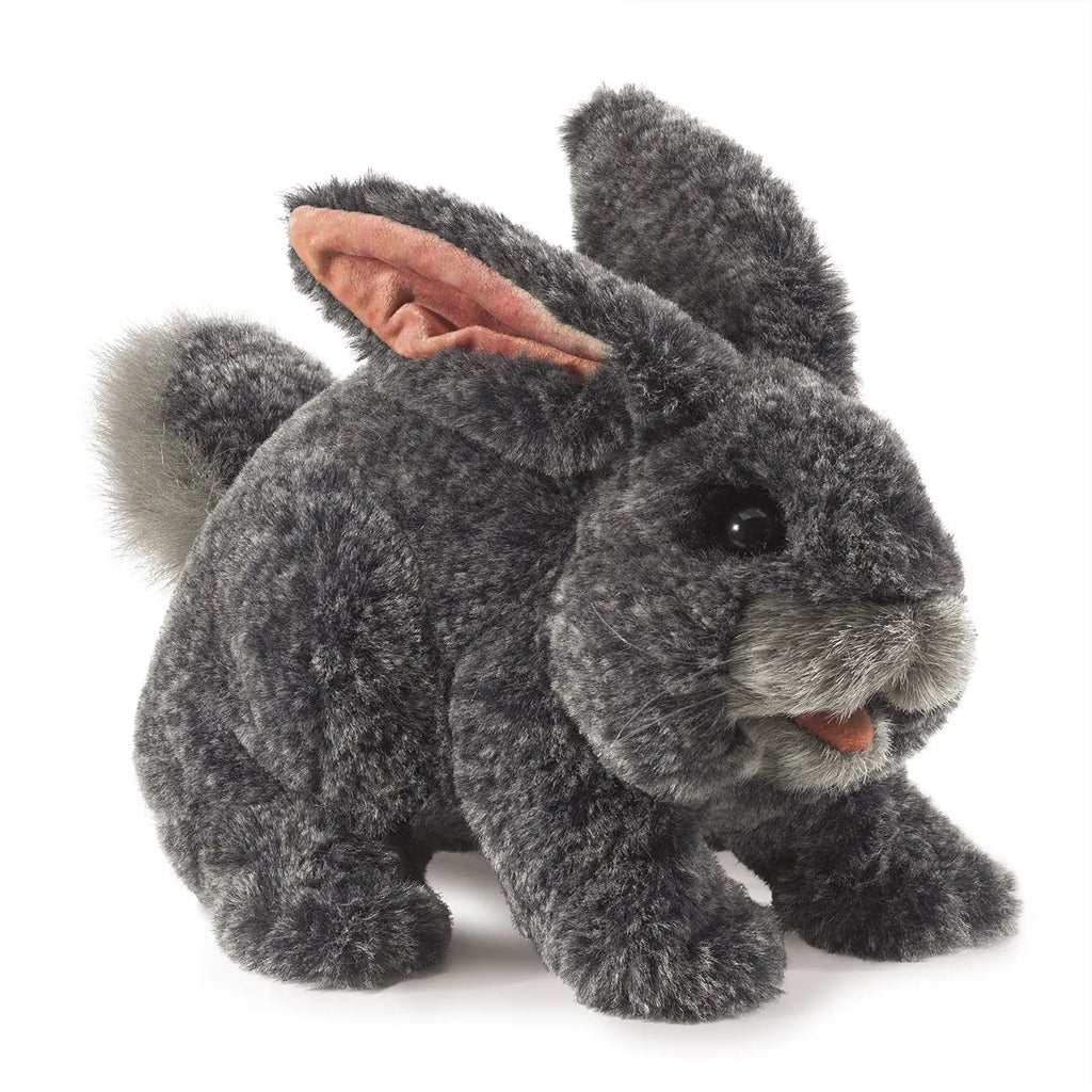 A plush gray rabbit toy with soft fur, black eyes, and a fluffy tail. Its pink inner ears and open mouth give a playful and cheerful appearance.