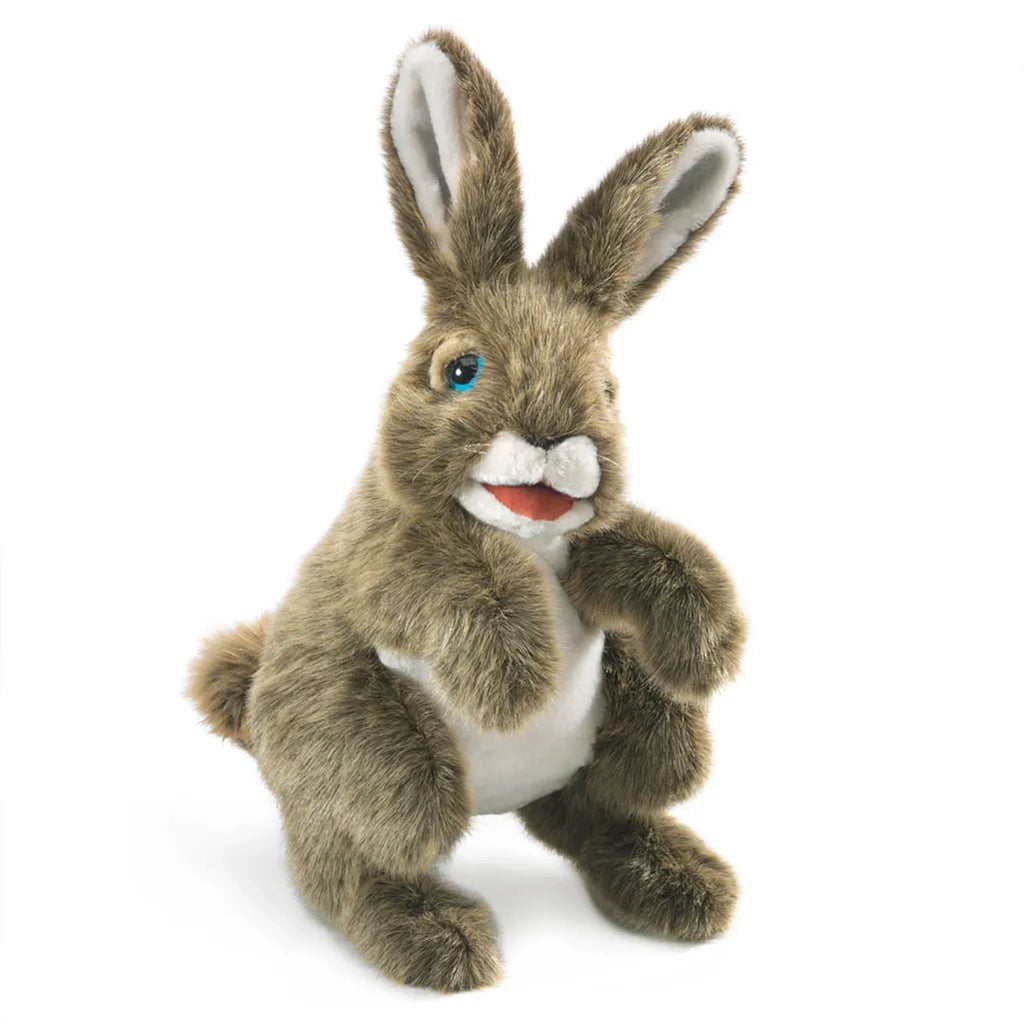 Fluffy brown rabbit puppet with large ears, bright blue eyes, and white belly. It has a playful expression, conveying friendliness and warmth.