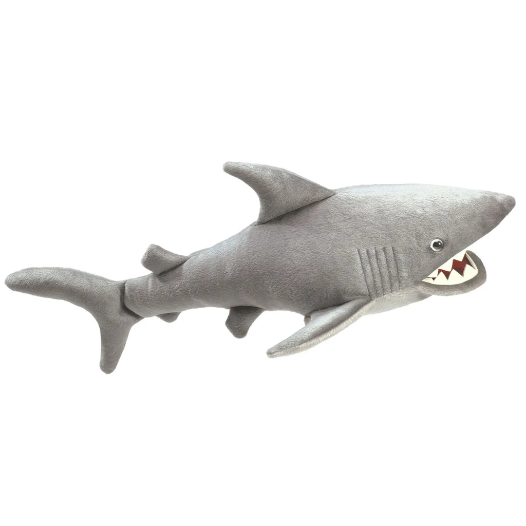 A gray shark plush toy with a friendly expression, showing serrated teeth. It has detailed fins and tail, exuding a playful and cheerful vibe.