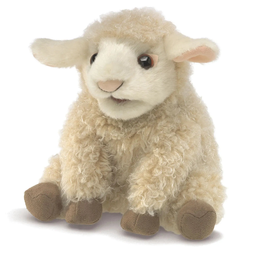 A plush lamb toy with curly cream fur sits with brown hooves and floppy ears, its soft face conveying a gentle and playful expression.