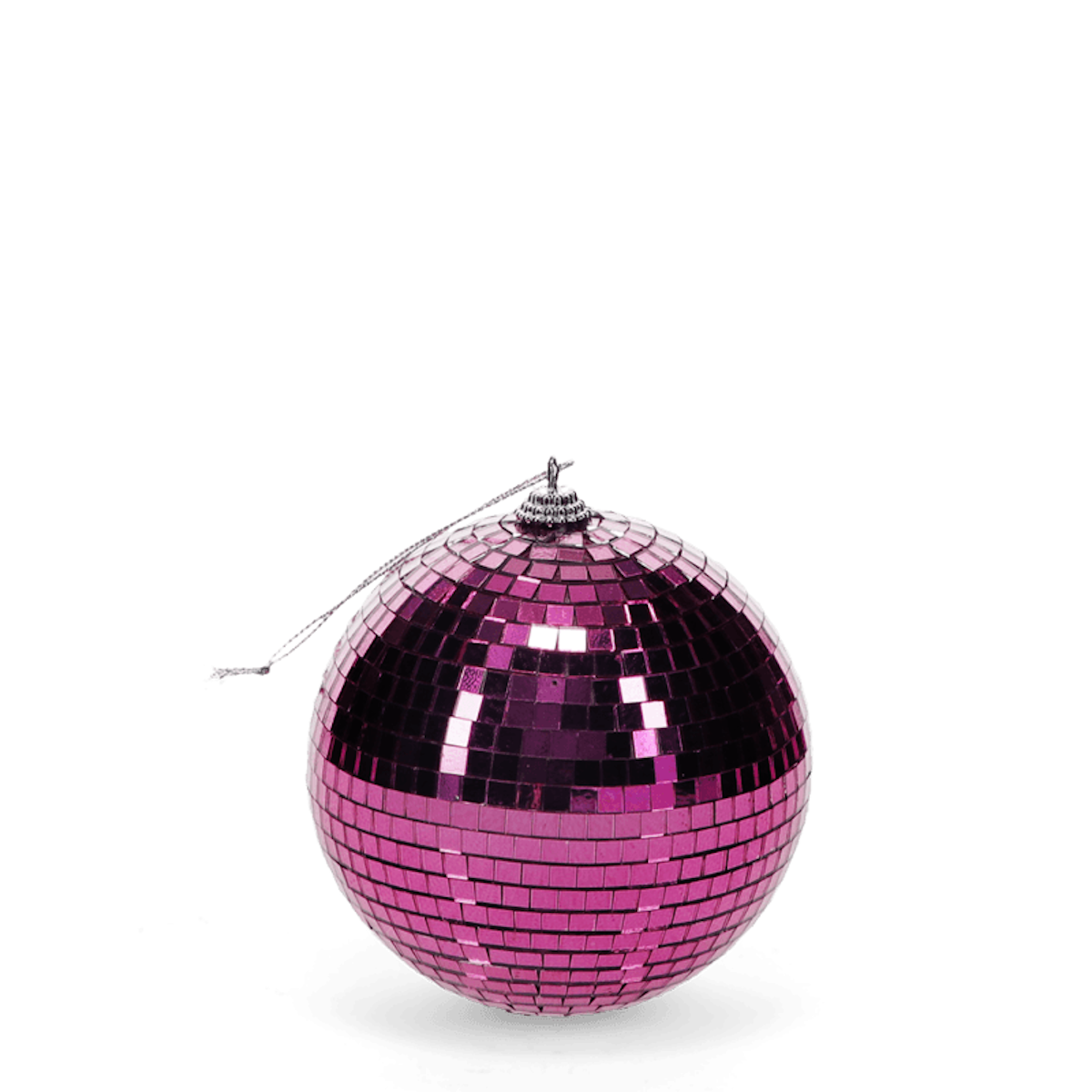 A shiny pink disco ball with reflective tiles hangs against a white background, evoking a vibrant and festive atmosphere.