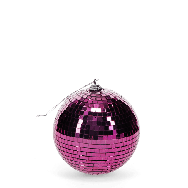 A shiny pink disco ball with reflective tiles hangs against a white background, evoking a vibrant and festive atmosphere.