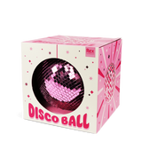 A pink disco ball partially exposed in a colorful box with star patterns, labeled "Disco Ball" and "Rex London," set against a white background.