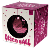 A pink Rex London disco ball packaged in a white and magenta box with star details.