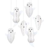 Six white paper honeycomb ghost decorations hanging against a white background.