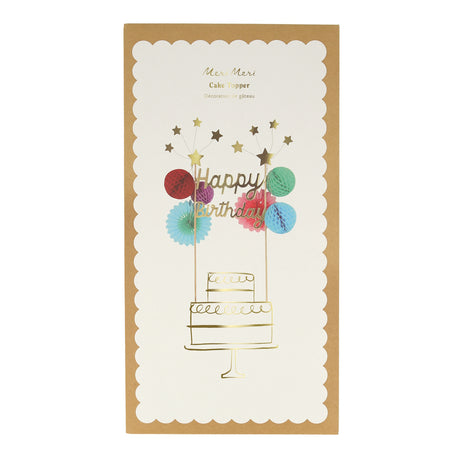 Packaged Meri Meri "Happy Birthday" cake topper with colorful honeycomb embellishments on a scalloped card.