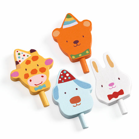 Set of four colorful wooden animal party favors featuring a giraffe, bear, dog, and bunny with party hats.