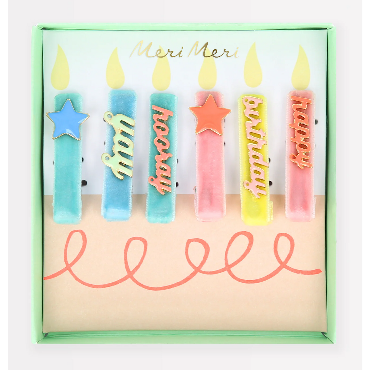 Meri Meri enamel hair clips in a gift box featuring birthday candle designs.