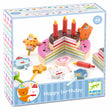 Djeco wooden birthday cake toy with colorful layers, candles, and animal decorations for kids aged 3 plus.