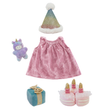 Olli Ella Dinkum Doll Happy Birthday Set with pink dress, party hat, plush cake shoes, and gift.