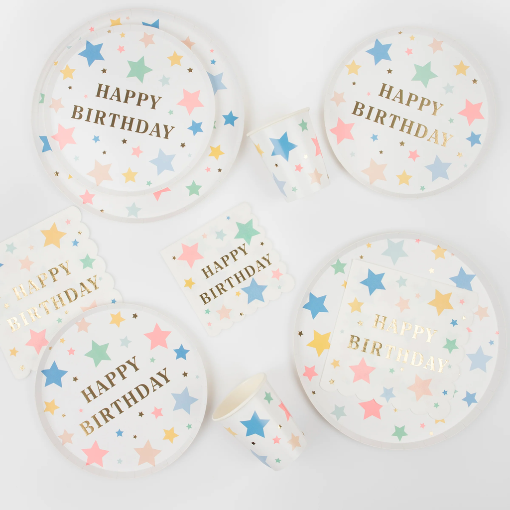 A set of festive napkins featuring colorful stars and 'Happy Birthday' text, perfect for party table settings.
