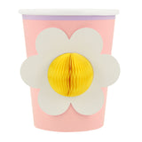 Pink Meri Meri party cup featuring a white flower with a 3D yellow honeycomb center.