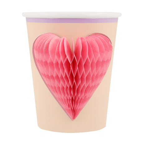 Peach Meri Meri party cup featuring a 3D pink honeycomb heart design.