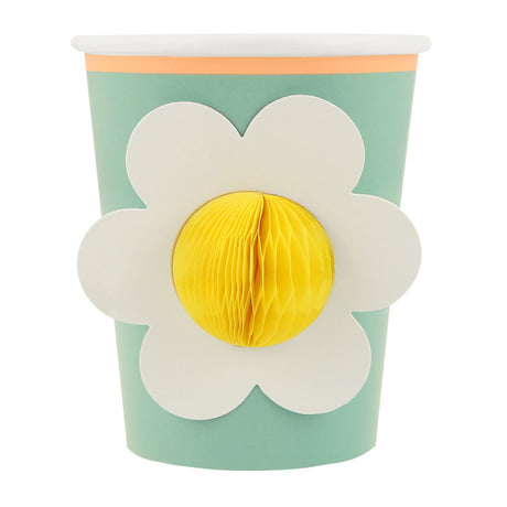Green Meri Meri party cup featuring a white flower with a 3D yellow honeycomb center.