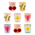 Meri Meri paper party cups featuring colorful designs with 3D honeycomb details like cherries, flowers, hearts, and gold stars.
