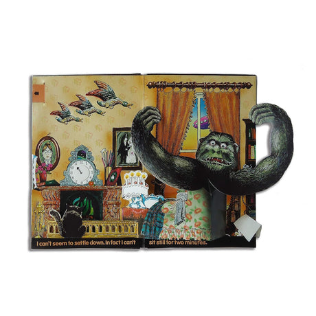 A large gorilla pop-up in a Victorian parlor from Jan Pieńkowski's Haunted House book.