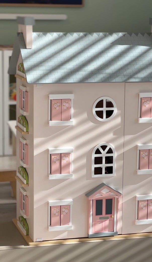 Heather Hall dolls house shown with furniture and dolls laid out together