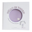 Cover of "Hello In There!" shows a circular cutout revealing an illustrated smiling baby on a lavender backdrop, with playful doodles of a girl holding a flower.