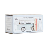 Product packaging box for a light blue toy camper van with a surfboard design on the front.