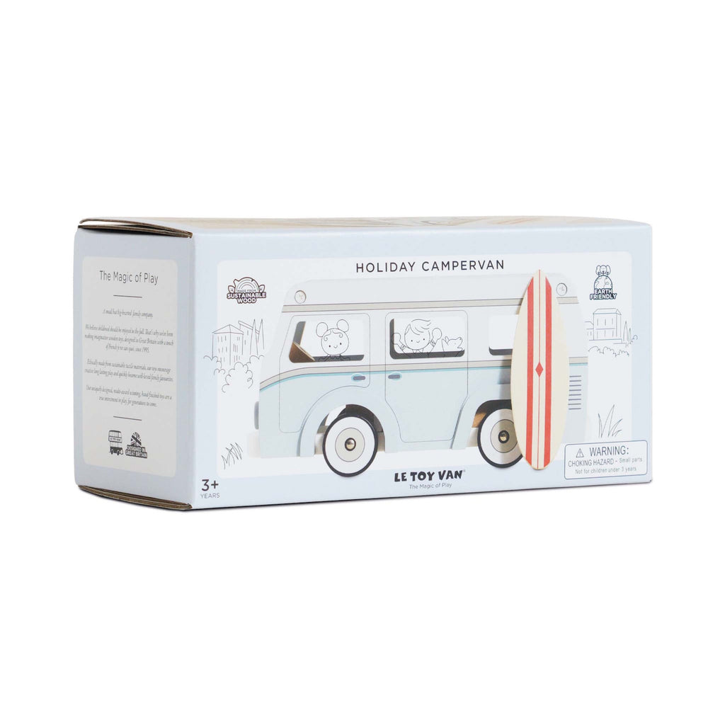 Toy campervan box featuring an illustration of a light blue camper with cartoon characters inside. A surfboard decorates the front. Ideal for ages 3+.