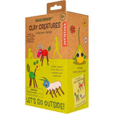 Huckleberry Clay Creatures kit packaging by Kikkerland, featuring colorful air-dry clay monsters with natural twig legs.