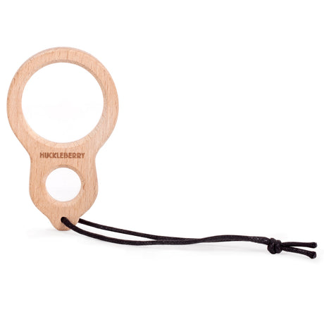 Wooden Huckleberry dual magnifier with two lenses and a black lanyard on a white background.