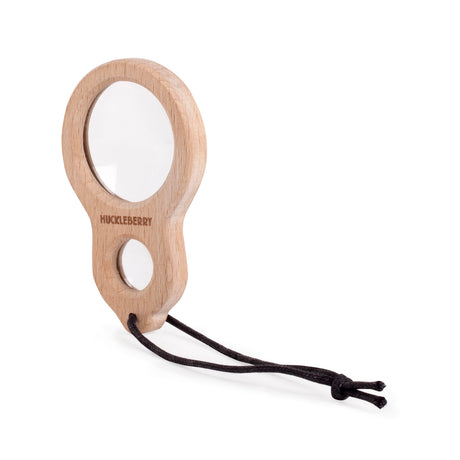 Huckleberry wooden dual magnifier with two lenses and a black lanyard on a white background for nature exploration.
