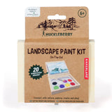 Huckleberry Landscape Paint Kit in brown cardboard packaging by Kikkerland with watercolor sheets.