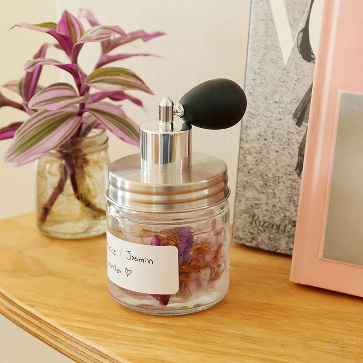 Huckleberry make your own perfume kit glass jar with dried flowers silver atomizer on wooden shelf.