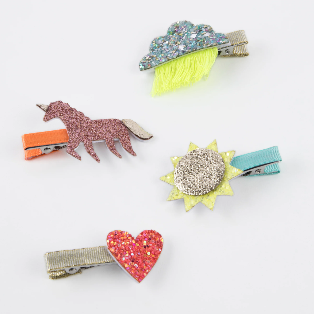A set of fun and colorful hair clips featuring playful icon designs, perfect for adding a stylish touch to any hairstyle.