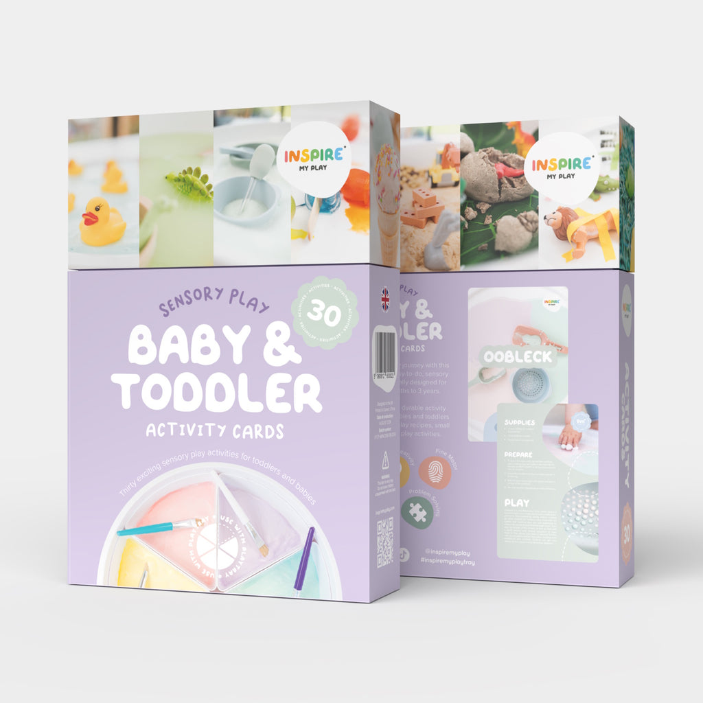 Box of "Baby & Toddler Activity Cards" for sensory play. Features playful design, pastel colors, rubber duck, paint, and crafting materials.