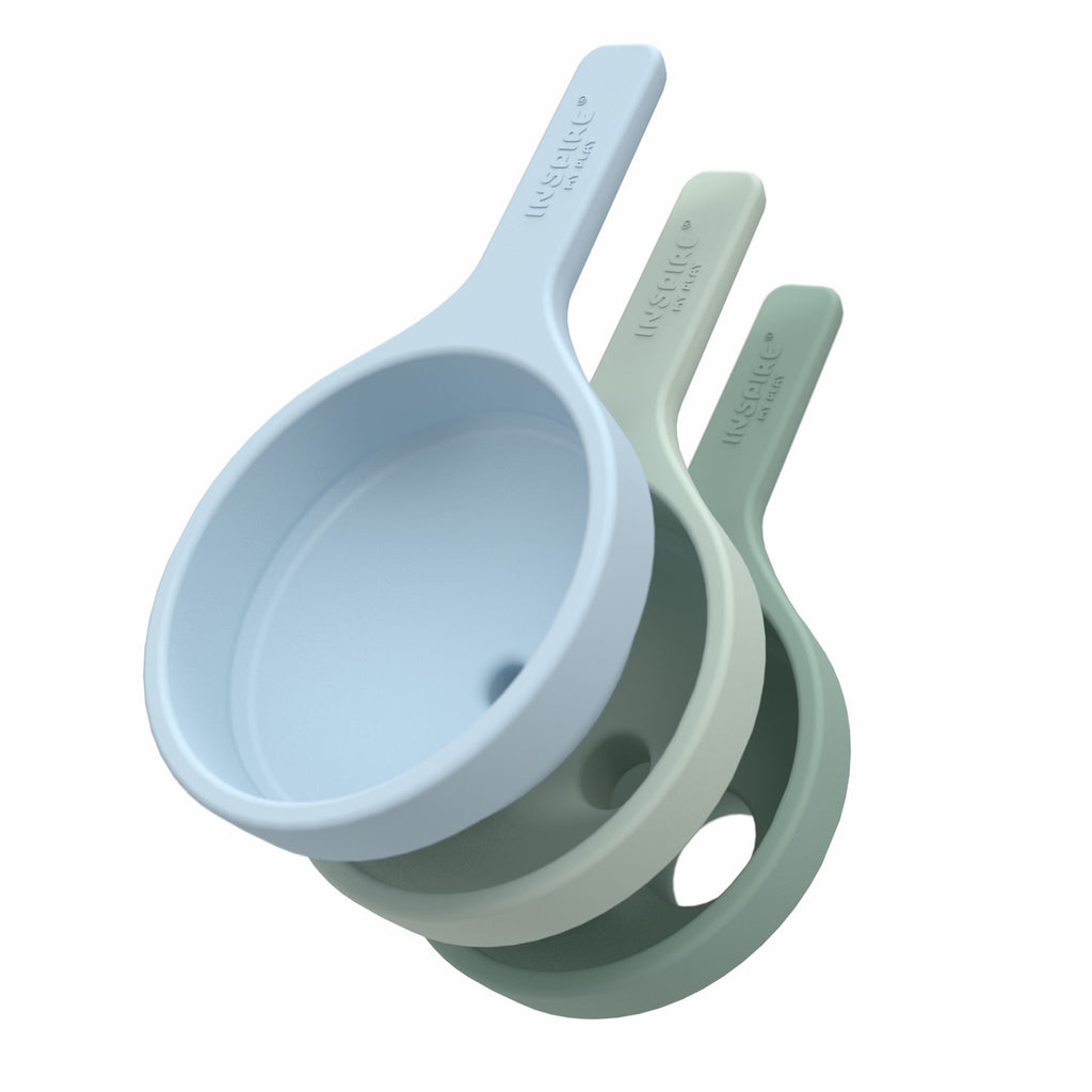 Three stackable silicone funnels in pastel blue and green, showcasing a minimalist and practical design.