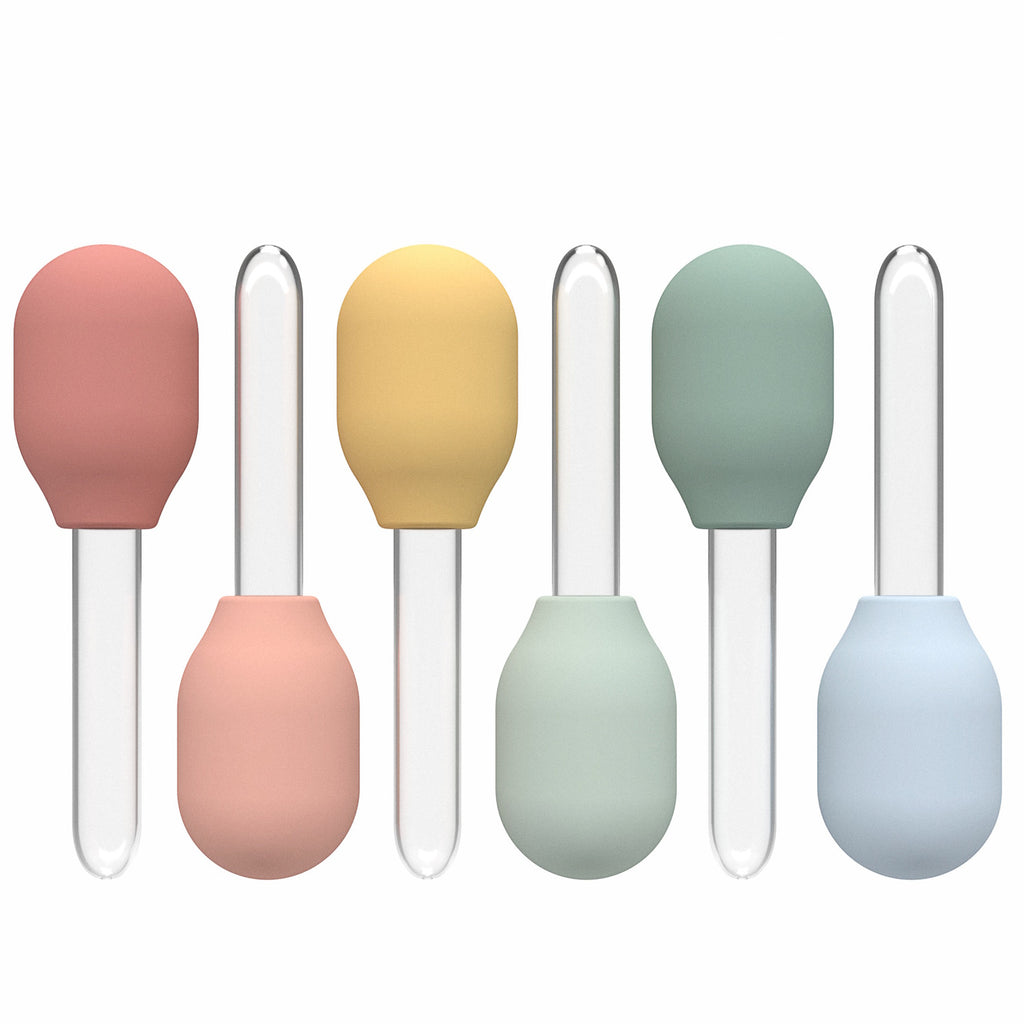 Colorful bulb-shaped dropper tops with pastel hues—red, pink, yellow, green, blue—attached to clear glass pipettes, displayed on a white background.