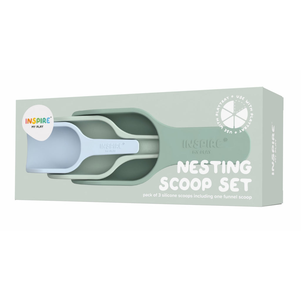 Packaging of a Nesting Scoop Set featuring three pastel silicone scoops in teal and light blue. Branding text says "Inspire My Play," creating a playful tone.