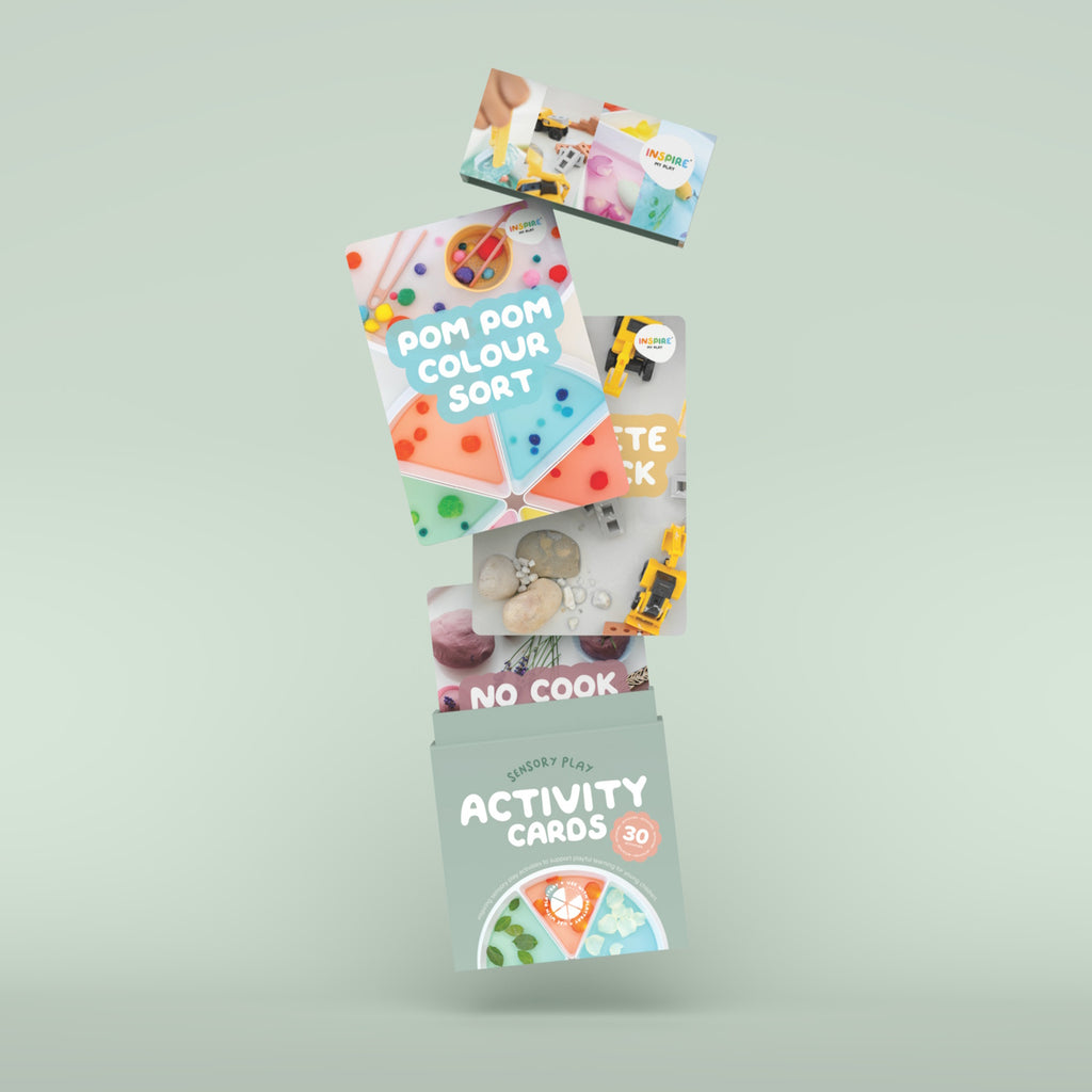Box of "Sensory Play Activity Cards" with vibrant images of toys and colorful activities, promoting playful learning for young children.