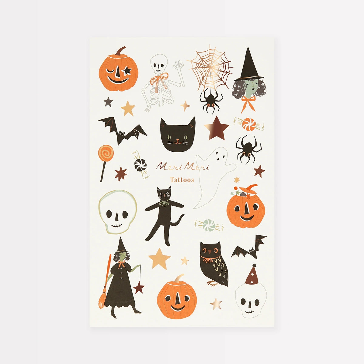 Meri Meri Halloween temporary tattoo sheet featuring pumpkins, cats, witches, and skeletons.