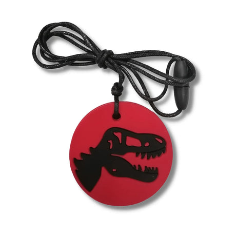 Red circular pendant necklace featuring a black T-Rex dinosaur skull silhouette on a black cord.