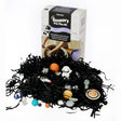 Jellystone Designs Galaxy Sensory Tray Play Kit box with space figures on black shredded paper filler.
