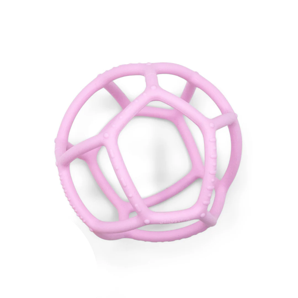 A pink, hollow, geometric ball with pentagon-shaped openings is centered on a white background. The design is airy and playful, evoking a sense of whimsy.