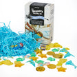 Jellystone Designs Under the Sea Sensory Kit with ocean trinkets, coins, blue shred, and box packaging.