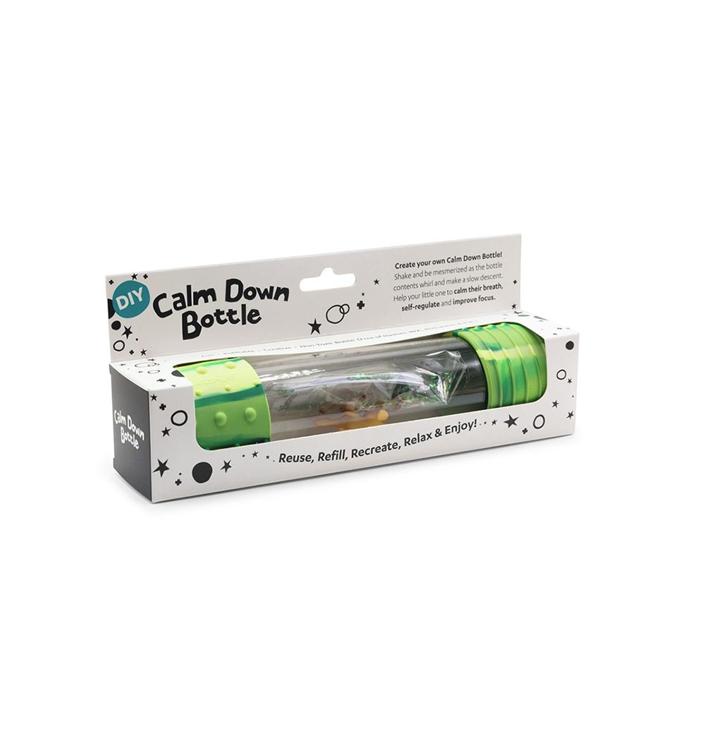 Packaged DIY Calm Down Bottle in dinosaur theme, featuring a transparent tube, green silicone caps, and tiny dinosaur figures inside