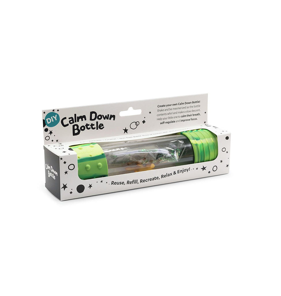 Packaged DIY Calm Down Bottle in dinosaur theme, featuring a transparent tube, green silicone caps, and tiny dinosaur figures inside